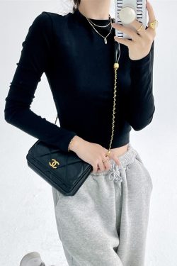 Black Long Sleeve High-Waisted Crop Top - Slim Fit Midriff-Baring T-Shirt for Spring 2025 - Korean Style Sexy Fashion