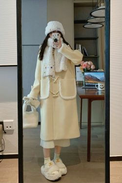 Milk Yellow Doll Collar Mid-Length Woolen Coat for Women - Elegant Slimming Design for Early Spring Fashion