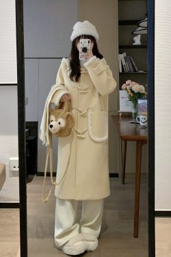 Milk Yellow Doll Collar Mid-Length Woolen Coat for Women - Elegant Slimming Design for Early Spring Fashion