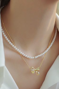 Trendy Double-Layer Bow Pendant Pearl Necklace for Women - Elegant Niche Design Clavicle Chain 2024